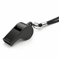 Black plastic whistle isolated on white background Royalty Free Stock Photo
