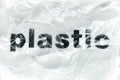 Black Plastic word on transparent white disposable plastic bag. Environment pollution problem concept image with copy space Royalty Free Stock Photo