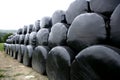 Black plastic wrap cover for cereal bales