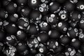 Black plastick beads. Hi res photo. Texture.