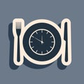 Black Plate with clock, fork and knife icon isolated on grey background. Lunch time. Eating, nutrition regime, meal time