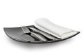 Black plate knife fork and a napkin Royalty Free Stock Photo