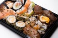 Black plate with variety of sushi