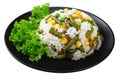 black plate with white rice, green peas, canned corn kernels, cut green beans isolated on white background Royalty Free Stock Photo