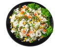 Black plate with white rice, green peas, canned corn kernels, cut green beans isolated on white background. top view Royalty Free Stock Photo