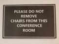 Black please do not remove chairs from the conference room sign