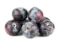 Black plums, isolated on white background Royalty Free Stock Photo
