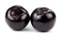 Black plums, isolated on white background Royalty Free Stock Photo