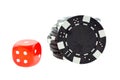 Black poker chips and red dice cube isolated