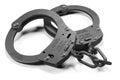 Black police handcuffs isolated on white background