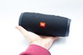 Black portable bluetooth speaker, with all-weather protection