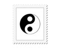 Black postal rubber stamp with the yin and yang taoistic symbol of balance
