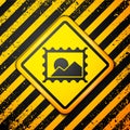 Black Postal stamp icon isolated on yellow background. Warning sign. Vector Illustration
