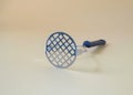 Black potato masher on background. Kitchenware. mashed potatoes Royalty Free Stock Photo
