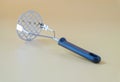 Black potato masher on background. Kitchenware. mashed potatoes Royalty Free Stock Photo