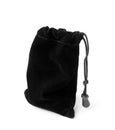 Black pouch made of soft velvet on a white background Royalty Free Stock Photo