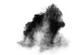 Black powder explosion. The particles of charcoal splatter on white background. Royalty Free Stock Photo