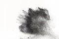 Black powder explosion on white background. Colored cloud. Colored dust explode. Paint Holi. Royalty Free Stock Photo