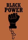 Black power hand with broken chains