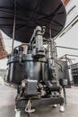 Black power transformer at old power station. Industrial part of electric substation Royalty Free Stock Photo