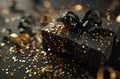 a black present with gold and ribbons