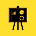 Black Presentation financial business board with graph, chart, diagram, pie graph icon isolated on yellow background Royalty Free Stock Photo