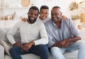 Black Preteen Boy Embracing Father And Granddad At Home, Posing To Camera Royalty Free Stock Photo