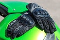 Black protective gloves for a motobiker with plastic inserts. Royalty Free Stock Photo