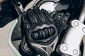 Black protective gloves for a motobiker with plastic inserts. Royalty Free Stock Photo