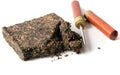 Black pu-erh chinese tea with special knife on a Royalty Free Stock Photo