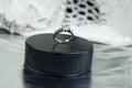 Engagement Ring on hockey puck with the inscription `Czech Republic` on the SILVER background. Royalty Free Stock Photo