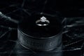 Engagement Ring on hockey puck with the inscription `Czech Republic` on the SILVER background. Royalty Free Stock Photo
