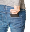 Black purse in back pocket Royalty Free Stock Photo