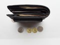 Black purse with paper and iron money top view Royalty Free Stock Photo