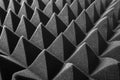 Black pyramids as an abstract background. Royalty Free Stock Photo