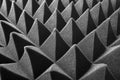 Black pyramids as an abstract background. Royalty Free Stock Photo