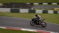 A black racing bike speeding uphill