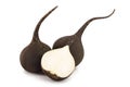 Black radish with half isolated on white background Royalty Free Stock Photo