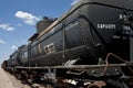 Black railroad tanker cars