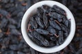 Black raisins in bowl Royalty Free Stock Photo