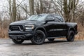 Black 2019 Ram Rebel 1500 pickup truck on a dirt road