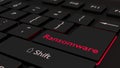 Black ransomware keyboard cybersecurity concept