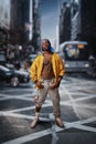 Black rapper on street, cityscape on background Royalty Free Stock Photo