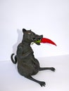Black rat with red chili , isolated on white background
