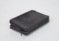 Black real leather small wallet for coins and credit cards Royalty Free Stock Photo