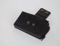 Black real leather small wallet for coins and credit cards Royalty Free Stock Photo