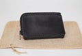 Black real leather small wallet for coins and credit cards Royalty Free Stock Photo