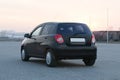 Black rear view compact modern city car Royalty Free Stock Photo