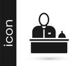 Black Receptionist standing at hotel reception desk icon isolated on white background. Vector Royalty Free Stock Photo