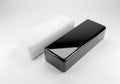 Black rectangular box with white sticker isolated on white background Royalty Free Stock Photo